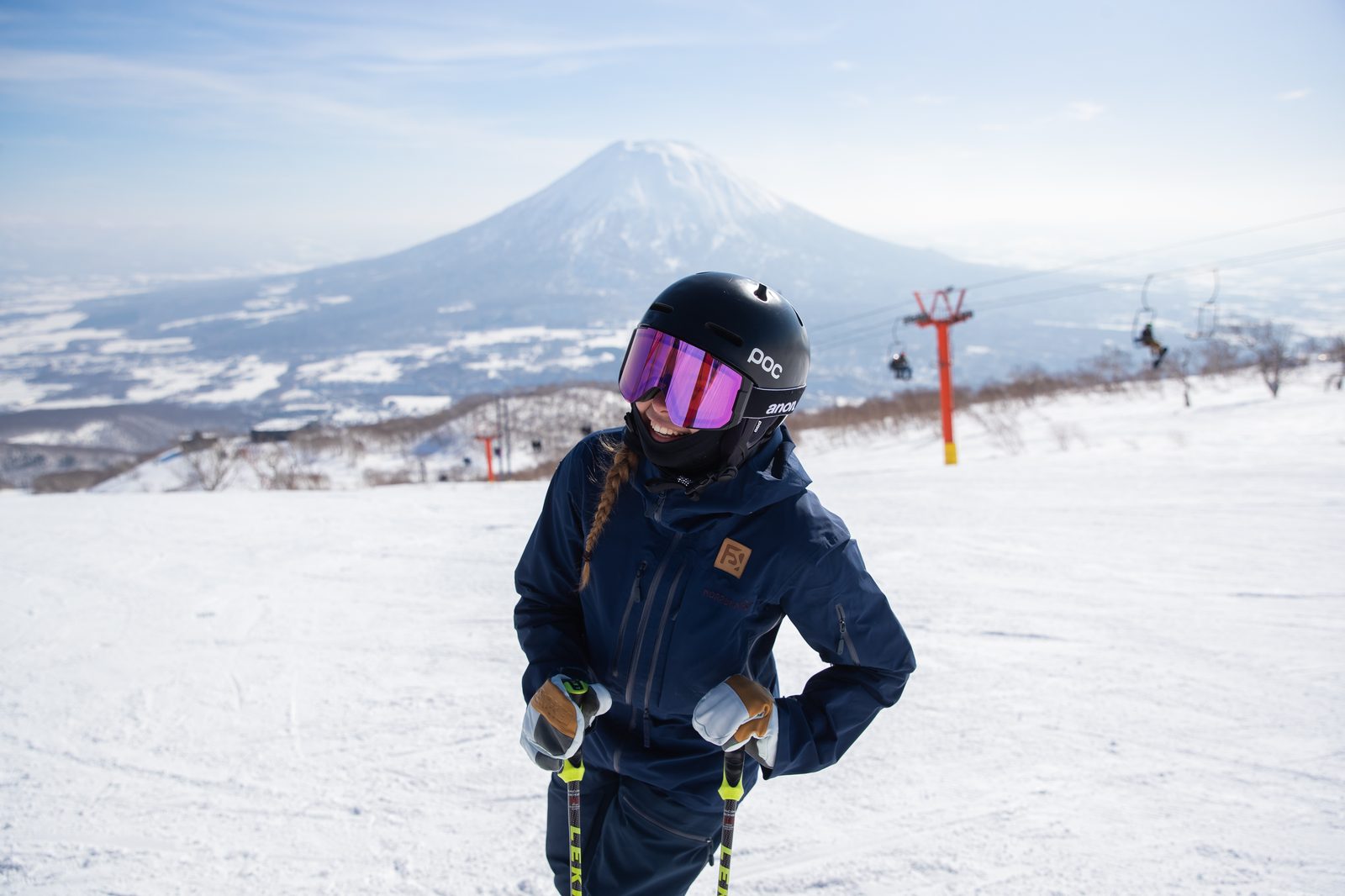 Paula on the slopes with Mt. Yotei behind her in Niseko